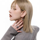 Kobine Women's Punk Diamante Floral Cross Earrings