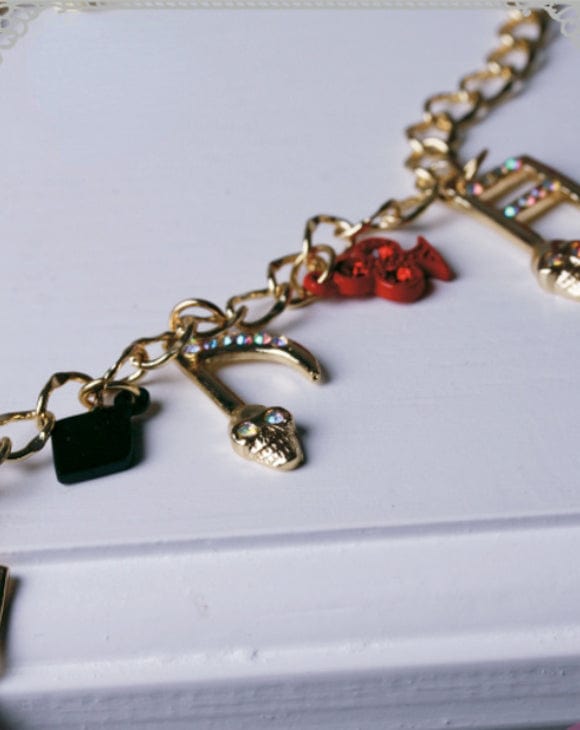 RQ-BL Women's Steampunk Skull Note Diamante Necklace